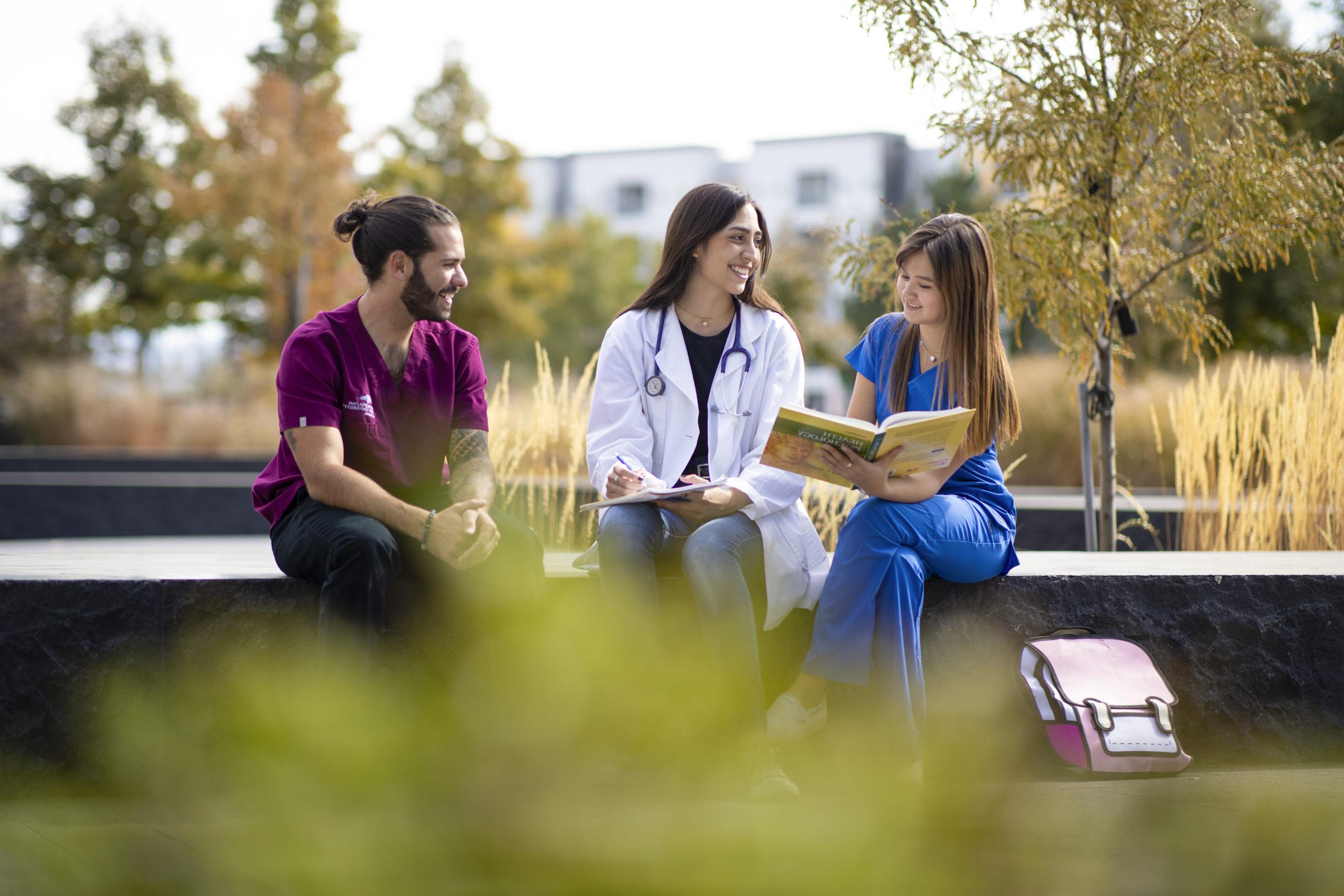 Three healthcare students studying on MSU Denver's campus.